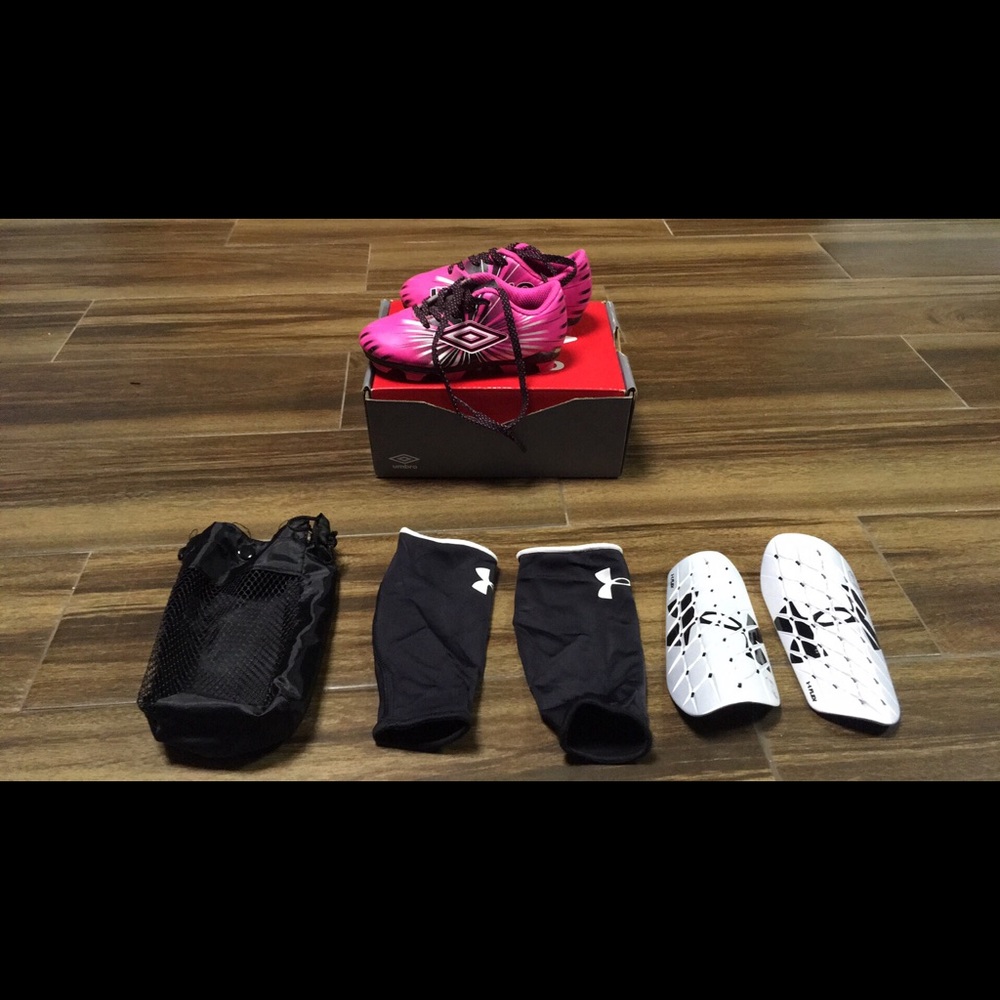 Toddler girl’s soccer cleats with shin gaurds